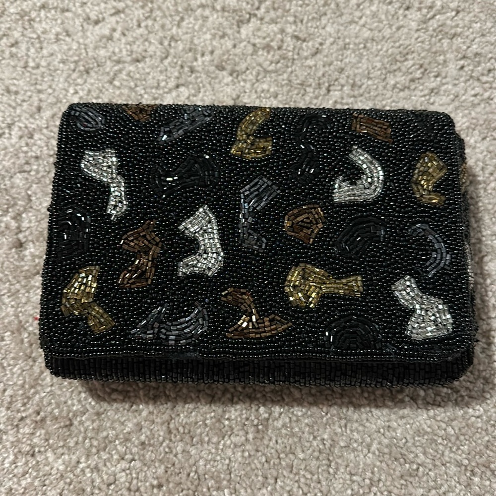 Small black and silver beaded clutch